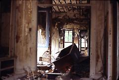 [Interior of a destroyed building]