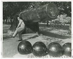 [Carl Erskine in front of cannon]
