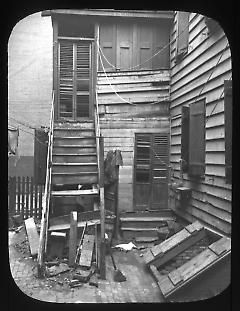 Views: Brooklyn. Various. View 025: Tenement House in Front Street. 1900.