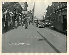 View of sidewalk on West Side of Manhattan Ave.