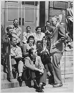 [Brooklyn College president conversing with students]