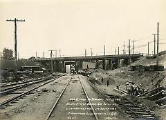 Showing 5th Ave. bridge and detail of contractors work on south side of right of way looking from L.I.R.R.