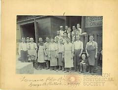 [Men gathered in front of the Lawrence Paper Box Co.]