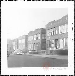 [North side of 64th Street looking northwest.]