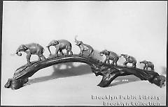 [Six miniature elephants]