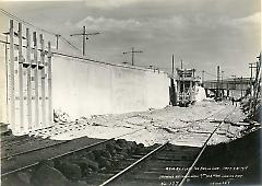 Showing retaining wall 7th to 8th Ave. looking east