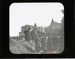 [Men examining railroad cable at moving of Hotel Brighton]
