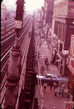 [Aerial view of street scene]