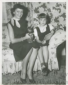 [Pee Wee Reese's wife and daughter]