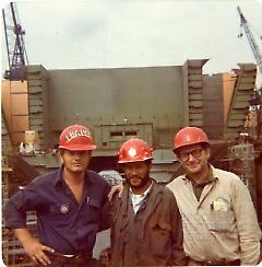 [Team leader "Rako" with Saul Sherman and another unidentified Seatrain worker]