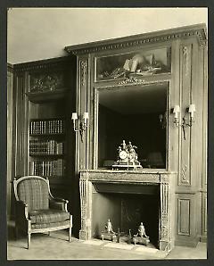 Weil-Worgelt apartment; upholstered chair and fireplace in French eighteenth-century revival style.