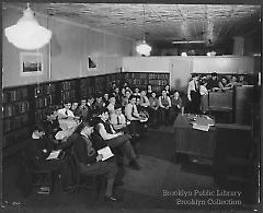 [School children in school library]