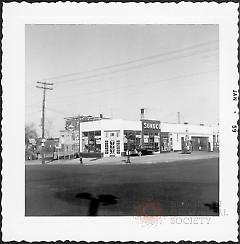 [Northwest corner of 65th Street (at left) and 7th Avenue, Brooklyn, L.I.]