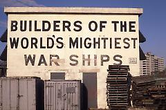[Old Navy yard sign that reads: Builders of the World's Mightiest War Ships]