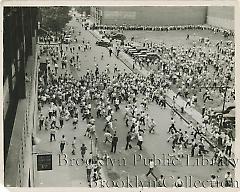 Mob scene as kids are let in free to Ebbets Field