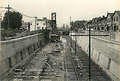 Looking west from 19th Ave. bridge showing retaining walls, roadbed, etc.