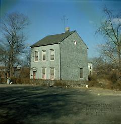 [Old house on north side of E. 100th Street.]