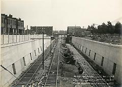 Looking east from 19th Ave. bridge showing retaining walls, roadbed, etc.