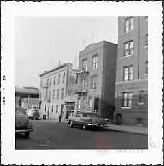 [North side of 61st Street, looking northwest toward corner of 3rd Avenue (far left).