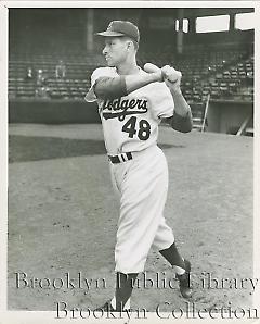 [Andy Pafko taking practice swings]