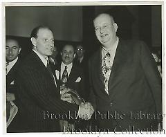 Leo Durocher shaking hands at trial