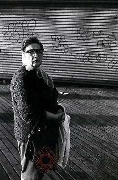 [Older woman on Coney Island boardwalk]