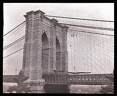 Views: U.S., Brooklyn. Brooklyn Bridge. View 005: Brooklyn tower; cobweb and the flies' from Fulton Ferry House, Brooklyn.