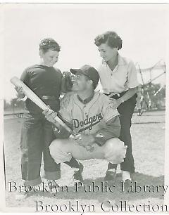 [Carl Furillo with young woman and boy]