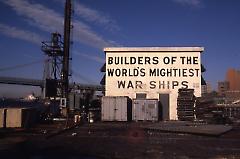 [Old Navy yard sign that reads: Builders of the World's Mightiest War Ships]