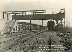 Looking east from 7th Ave. showing station steel work and overhead foot bridge