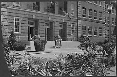 [Female students in front of Boylan Hall]