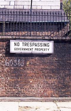 [Old Navy sign that reads: No Trespassing, Government Property]