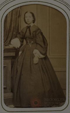 [Woman Wearing Fashionable Dress]