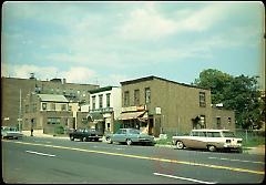 [East side of Fourth Avenue 99th Street at left.]