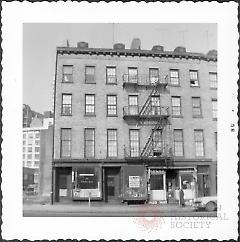 [#200 Fulton Street (a barber shop) at left.]