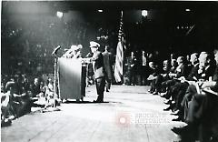 [Speaker at rally in Madison Square Garden]