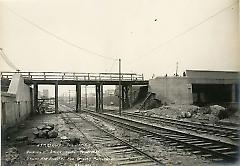 Showing 11th Ave. crossing, temporary bridge and facilities for trolley passengers