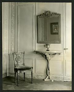 Weil-Worgelt apartment; velvet upholstered chair, mirror, and console table in French eighteenth-century revival style.