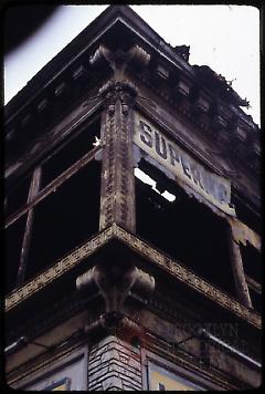 [Corner of a damaged building]