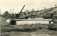 Looking north showing east portal of subway and walls between 4th and 5th Aves.