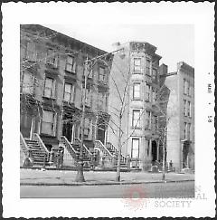 [#188 Washington Avenue at far left, then #186 Washington Avenue, then #184 Washington Avenue, with #182 Washington Avenue (building with bay window) at right.]