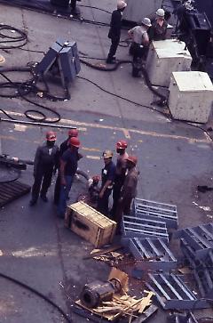 [Seatrain workers and the supervisor, "Frenchie" on the deck]