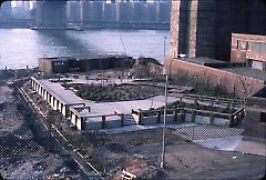 [park deck under construction next to Brooklyn Bridge]