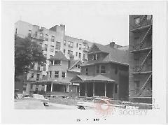 [Two houses being demolished.]