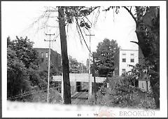 [View looking west from bridge over L.I.R.R. at East 14th Street.]