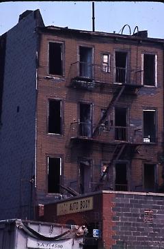 [Back view of damaged building]
