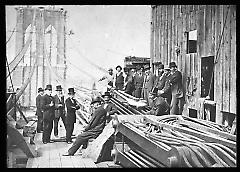 Views: U.S., Brooklyn. Brooklyn Bridge. View 018: The building of the Brooklyn Bridge. Anchorage-Messers (Charles C.?) Martin, (William A.?) Kingsley et al..