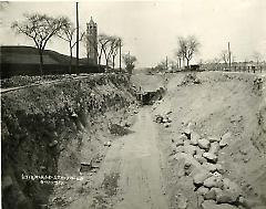 [Subway construction on Eastern Parkway near water tower]