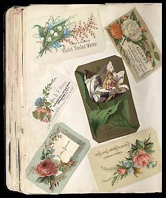 Full view of scrapbook page. Includes 2 tradecards of Brooklyn businesses: Baldwin's, Mrs. A. A. Barney.