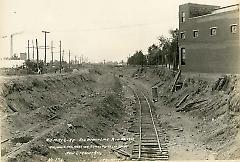 Showing excavation looking east from New Utrecht Ave.